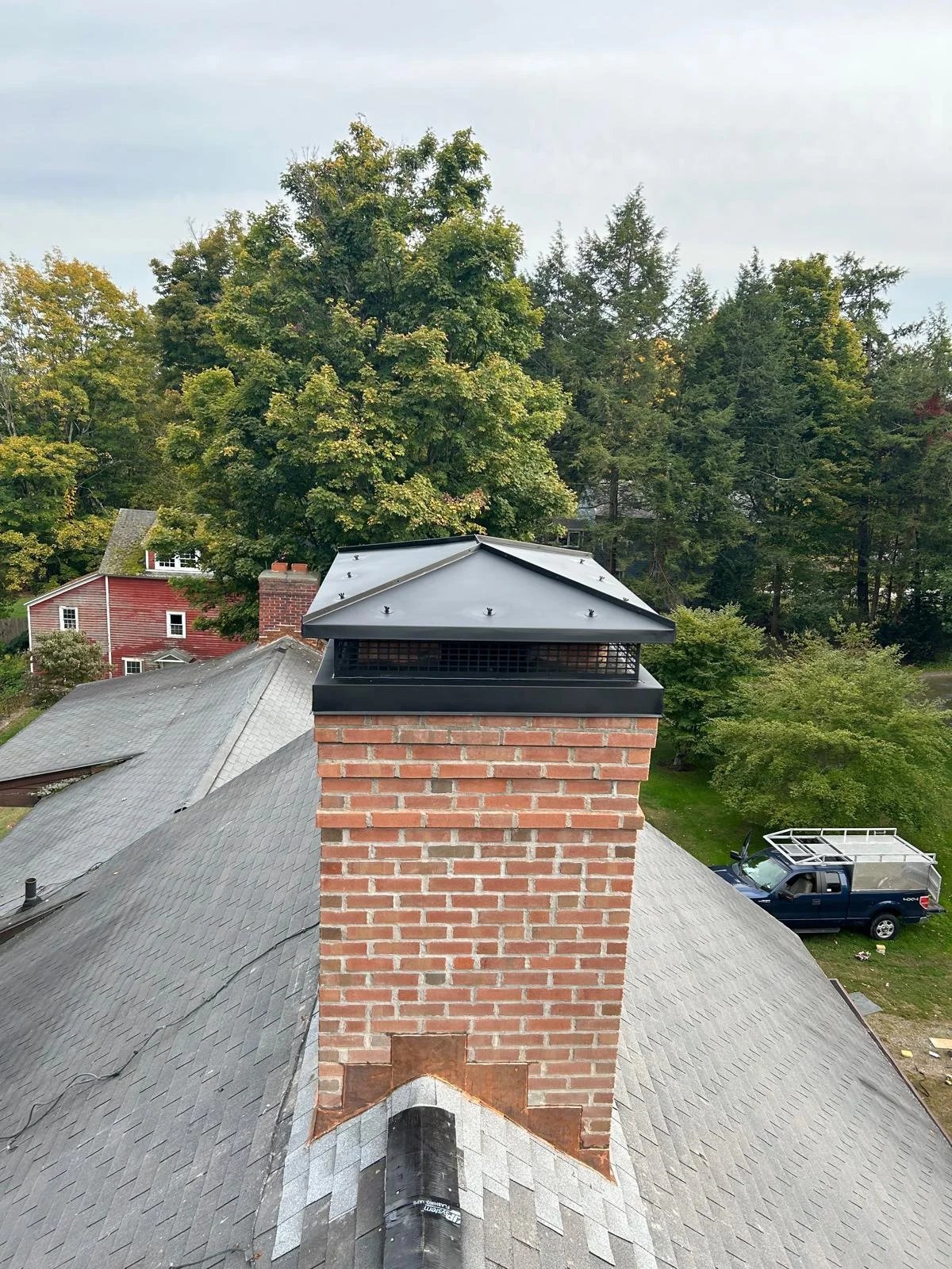 ABC Chimney Solutions rebuilt brick chimney with a new stainless steel cap